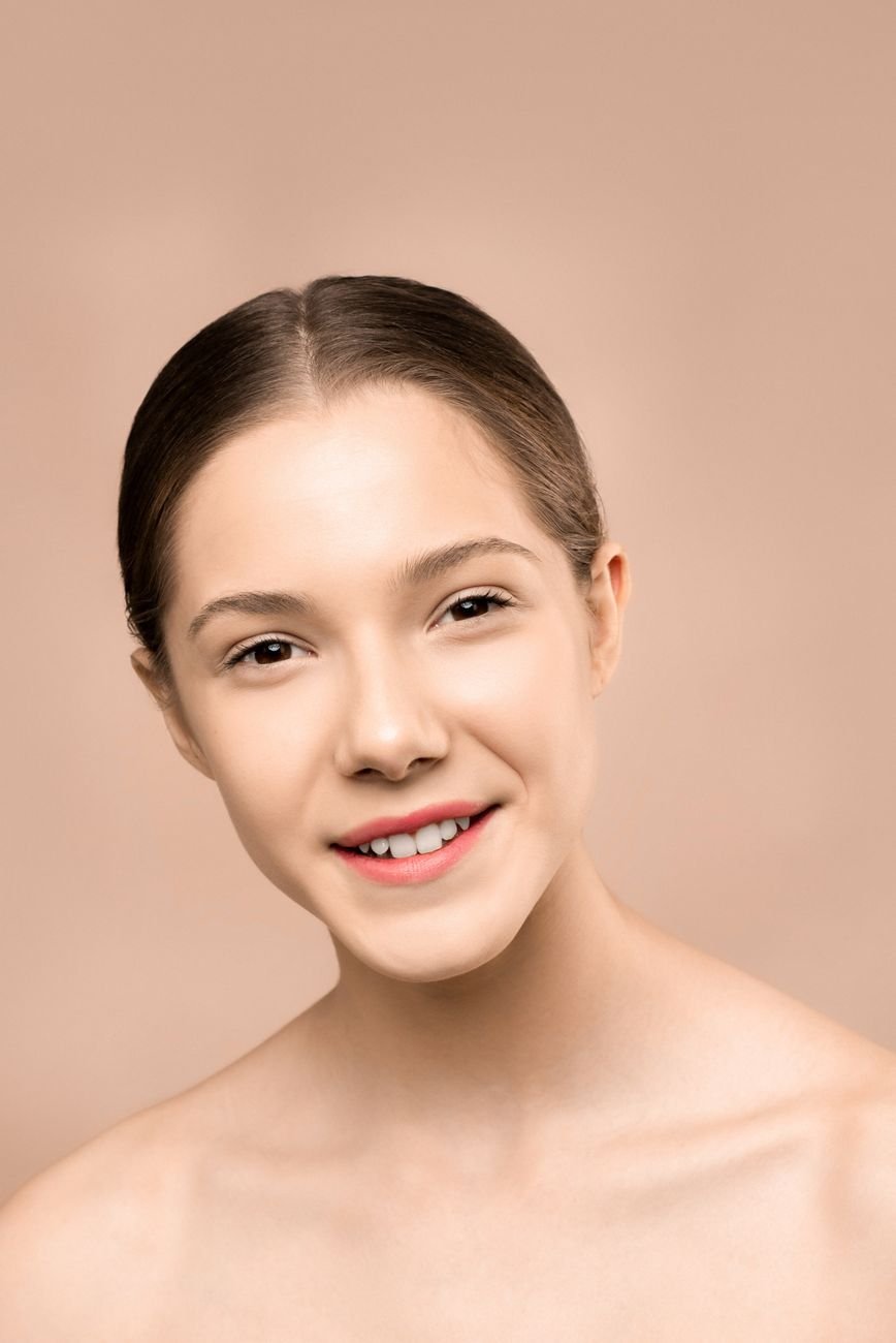 Woman with radiant, clear skin and natural beauty